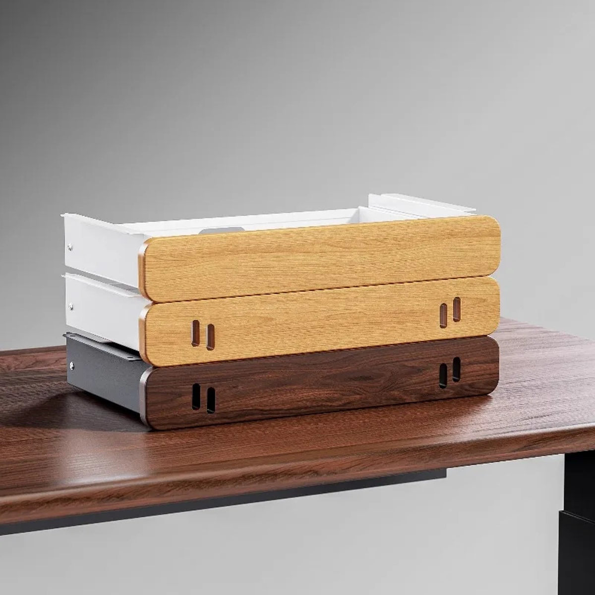 Walnut-finish under-desk drawer mounted below a clean workspace